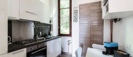 Apartamento, vista para a cidade | Cozinha privada