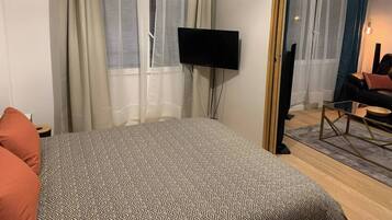 1 chambre, fer et planche Ă repasser, Wi-Fi, draps fournis