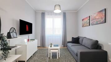 Apartamento, 1 quarto, vista para a cidade | Sala de estar