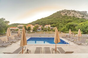 Alberca al aire libre por temporada