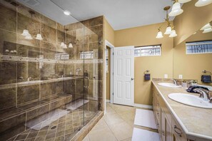 Shower, hair dryer, towels, shampoo