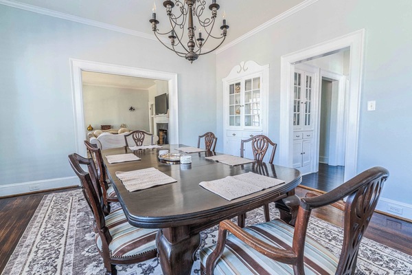 Hardwood elegance meets comfortâseating for everyone at the dining table.