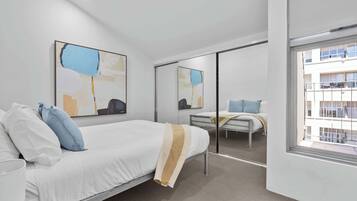 2 bedrooms, desk, iron/ironing board, travel crib