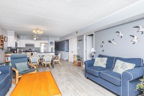 TV - Cozy 3 bedroom condo with wiFi, flat screen televisions, books, and a distant ocean view located uptown near mini golf and a movie theater and a mere stroll to the beach! (Ocean City)