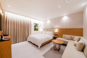 Deluxe Double Room, Non Smoking | Premium bedding, down comforters, blackout drapes, soundproofing - Daisy Hotel (Tongyeong)