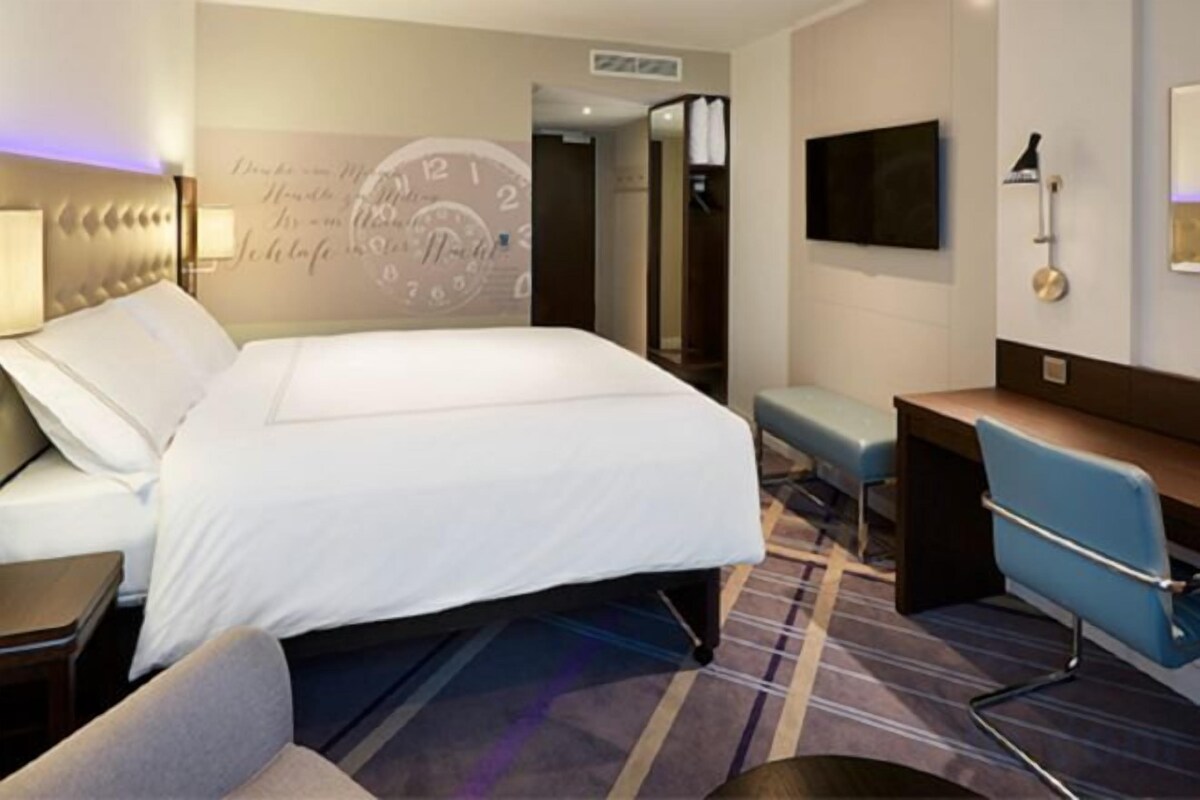 Quartos à prova de som, Wi-Fi de cortesia, roupa de cama