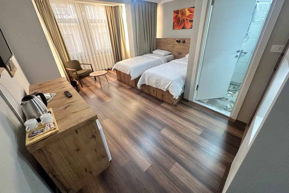Habitación estándar, 1 habitación | Escritorio, wifi gratis y ropa de cama