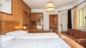 Premium bedding, down duvets, in-room safe, desk