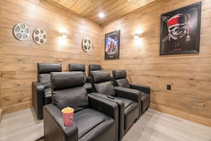 Hillside Horizon's theater room - *Pet-friendly 4BD Cabin w/ POOL + Hot Tub!* (Pigeon Forge)