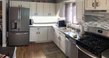 Spacious 4 bedroom home walking distance from snowmobile and orv trails