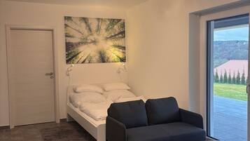 1 bedroom, desk, iron/ironing board, travel cot