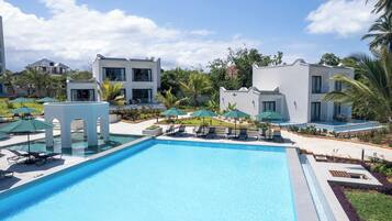 Indoor pool, 3 outdoor pools, open 8:00 AM to 7:00 PM, pool umbrellas