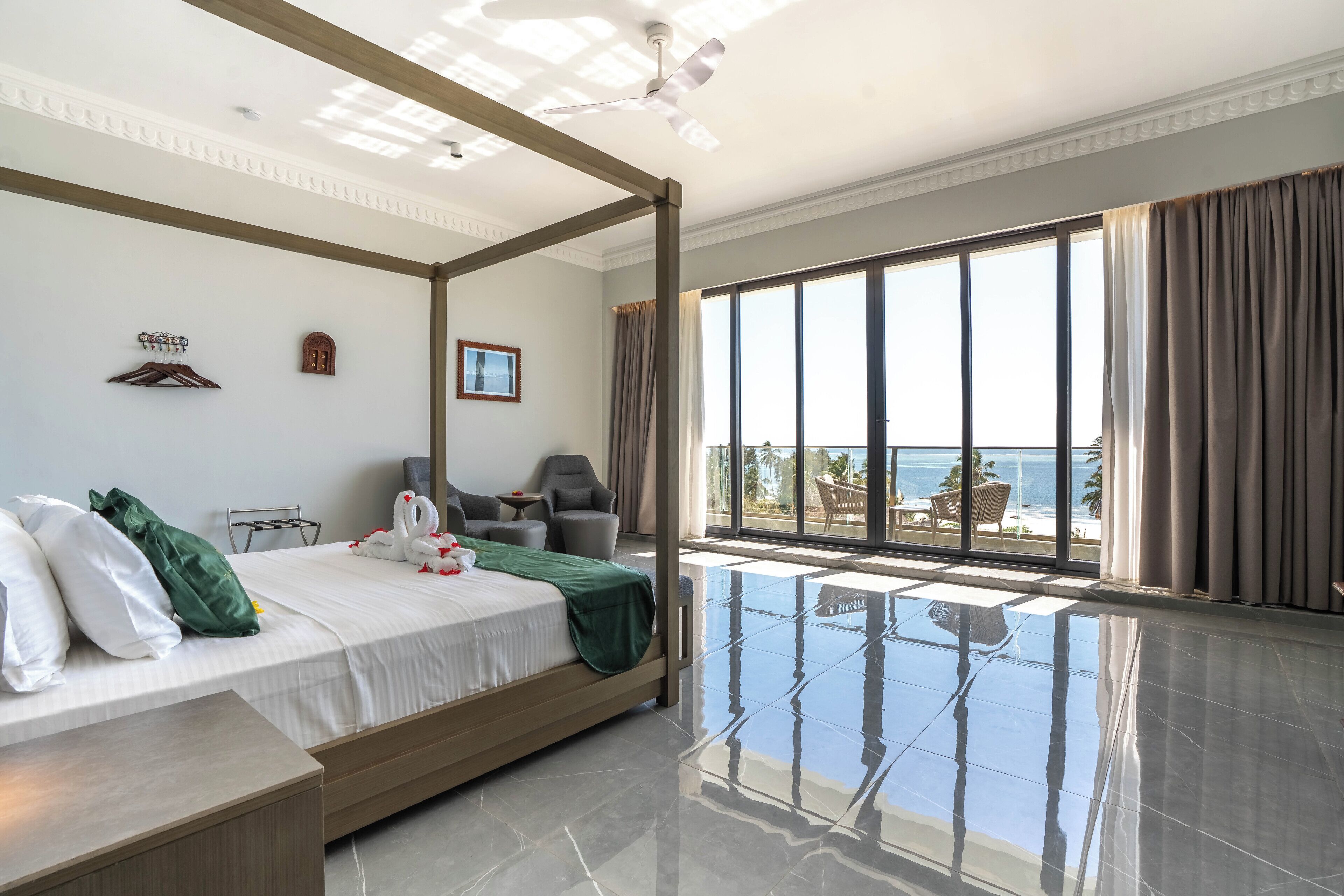 Suite with Balcony, Pool view & Sea view | Minibar, in-room safe, desk, laptop workspace