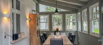 Landhaus hinter'm See vacation apartment Landliebe luxurious winter garden tiled stoves