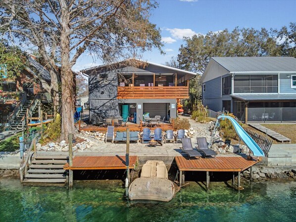 Exterior - Beautiful Weeki Wachee river house with kayaks, slide, and river views (Spring Hill)
