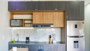 Departamento Confort, vista al patio | Cocina privada