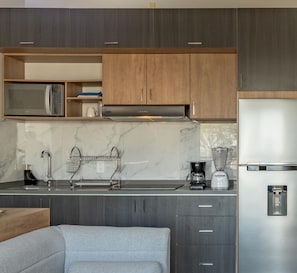 Departamento Confort, vista al patio | Cocina privada