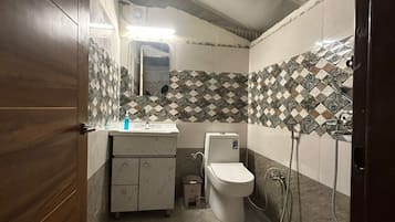 Family Tent, Patio, River View | Bathroom | Shower, towels, soap, shampoo