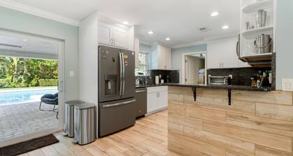 Charming 4-Bedroom Beach Bungalow with Idyllic Pool & Backyard