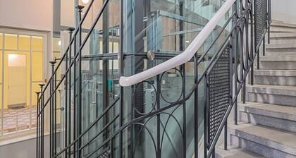 Chic Navy Studio with Balcony & Church View