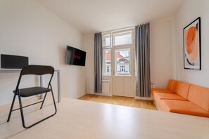 TV - Chic Navy Studio with Balcony & Church View (Prague)