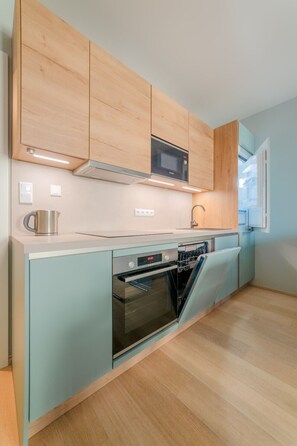 Fridge, stovetop, coffee/tea maker, cookware/dishes/utensils