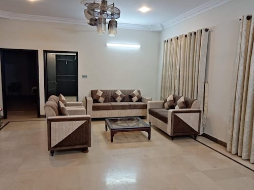 Spacious 3-bedroom apartment with WiFi, AC in charming Karachi