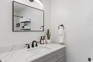 Hair dryer, towels - Sleek modern design meets peaceful retreat for a comfortable stay. (Burley)