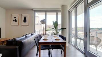 Apartment | Living area | 50-inch plasma TV with cable channels