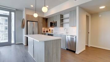 Apartment | Private kitchen | Coffee/tea maker, dining tables