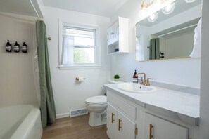 Hair dryer, towels, soap, shampoo
