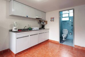 Fridge, microwave, stovetop, coffee/tea maker