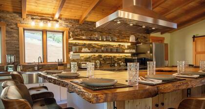 Private 40-acre retreat with creek, swimming hole, hot tub, fire pit, sleeps 18, dog-friendly, near golf & casinos.