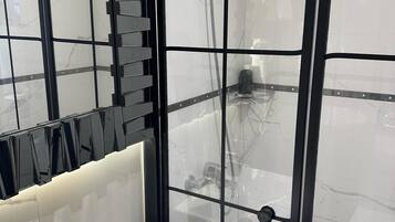 Shower, free toiletries, hair dryer, towels