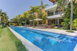 Outdoor pool, open 7:00 AM to 11:00 PM, sun loungers