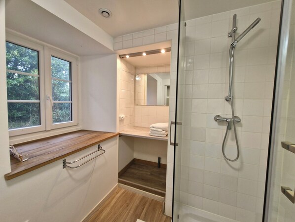 Shower, hair dryer, towels, soap