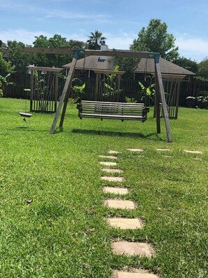 Property grounds - Renovated charming studio with private patio and yard (Gulf Breeze)