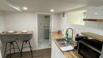 Fridge, microwave, stovetop, coffee/tea maker