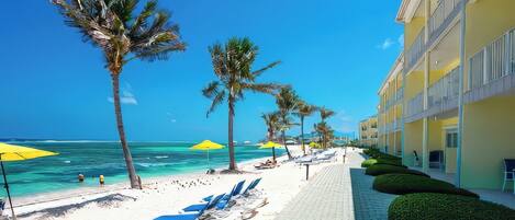 On the beach, sun-loungers, beach towels