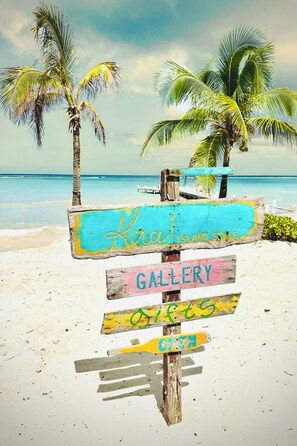 On the beach, sun-loungers, beach towels