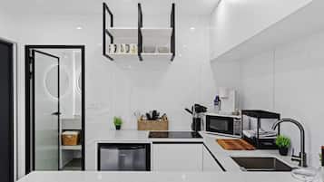 Microwave, stovetop, coffee/tea maker, kitchen islands