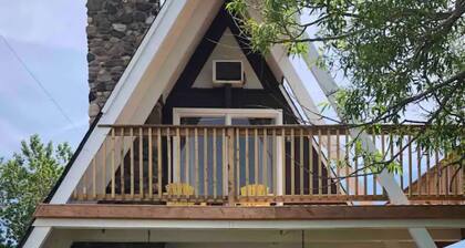 Water view cottage with hot tub, beach access and fire pit