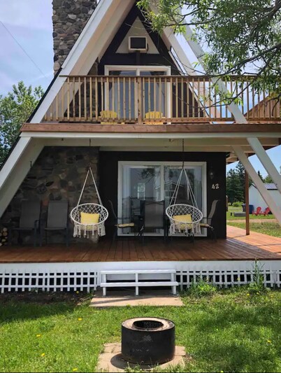 Water view cottage with hot tub, beach access and fire pit