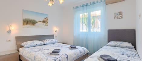4 habitaciones, tabla de planchar con plancha y wifi gratis