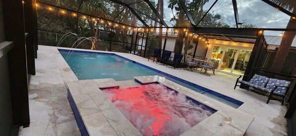 Outdoor pool, a heated pool - Charming 4-bedroom plus den villa with pool and spa near the beach and downtown. (Naples)