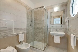Shower, bidet, towels