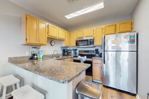 Fridge, microwave, oven, stovetop - Beachfront condo with private balcony, shared pool/hot tub/BBQ (Miramar Beach)