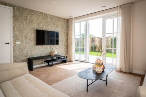 Casa conforto, 4 quartos | Sala de estar