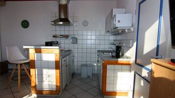 Comfort Apartment, 1 Bedroom | Private kitchen | Fridge, microwave, oven, dishwasher