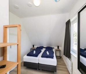 Casa conforto, 2 quartos | 4 quartos, individualmente mobiliados, roupa de cama